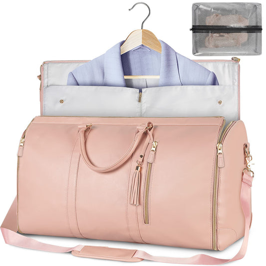 Pink foldable garment travel bag with shoulder strap and zip closure