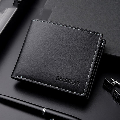 Black leather wallet with 'DEAGOU' branding on a dark surface with office items.