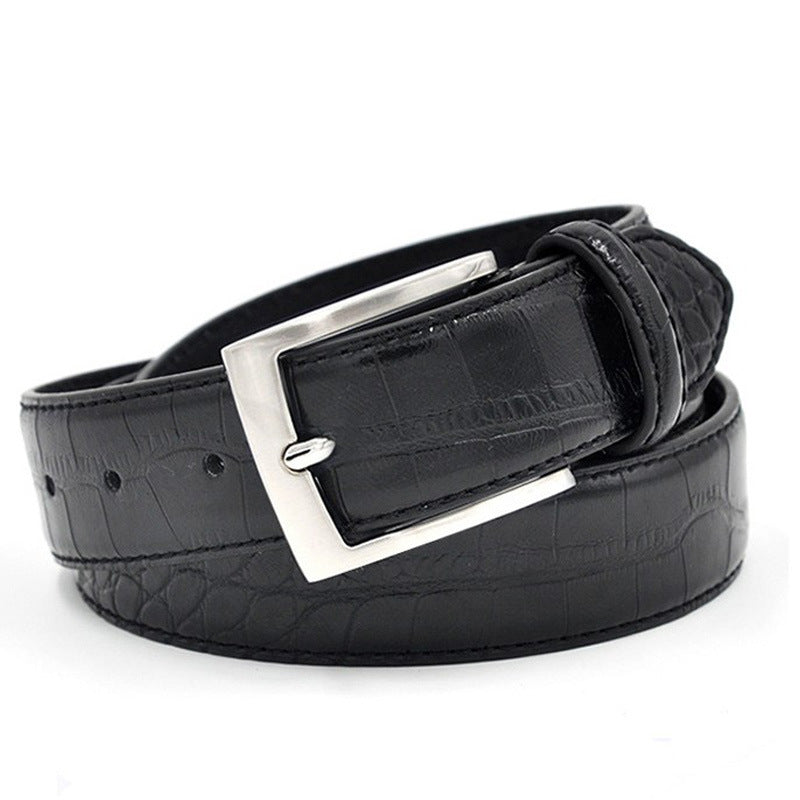 Black crocodile-patterned belt with a silver buckle on a white background