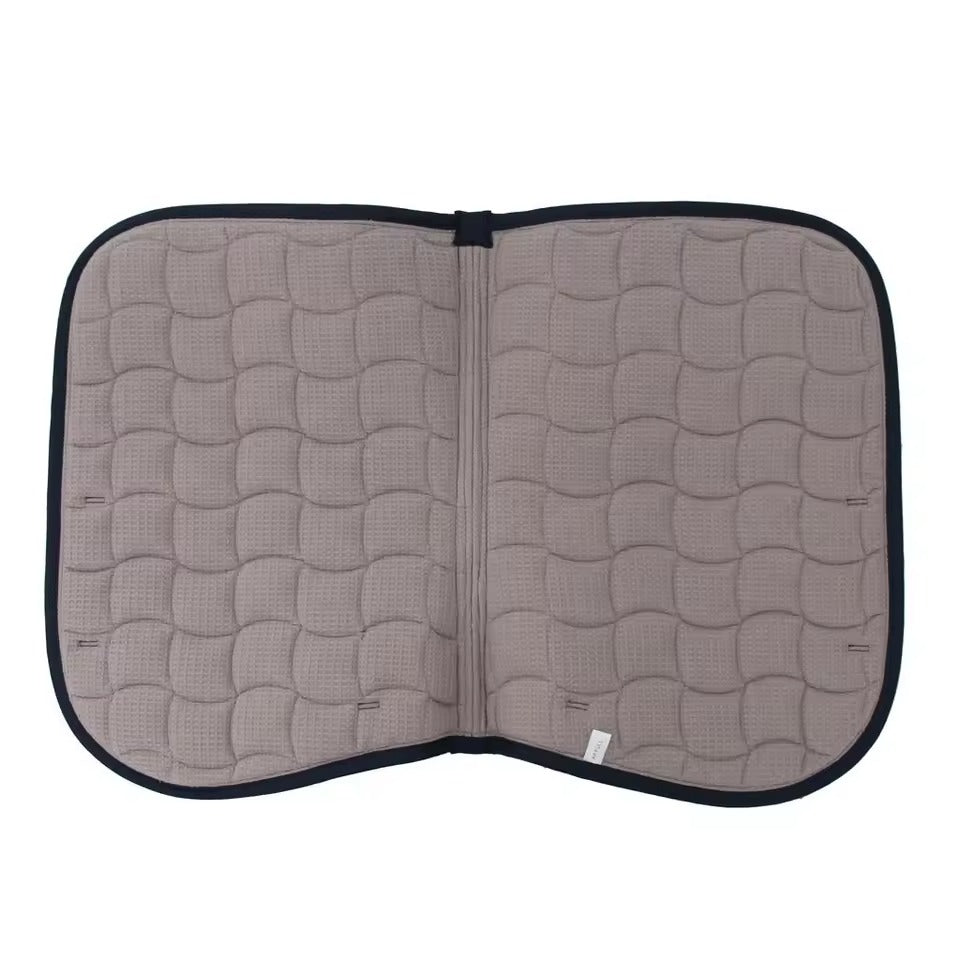 Quilted seat cover with wavy pattern on a white background