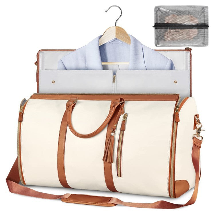 Foldable garment travel bag in beige with dual handles and detachable shoulder strap