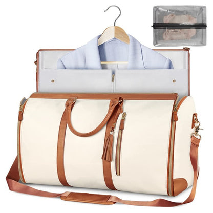 Foldable garment travel bag in beige with dual handles and detachable shoulder strap