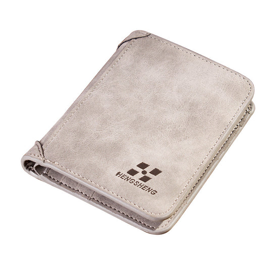 Grey men's card holder wallet with foldable design and logo on front.