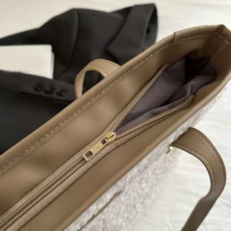 Top view of plush tote shoulder bag showing zipper closure